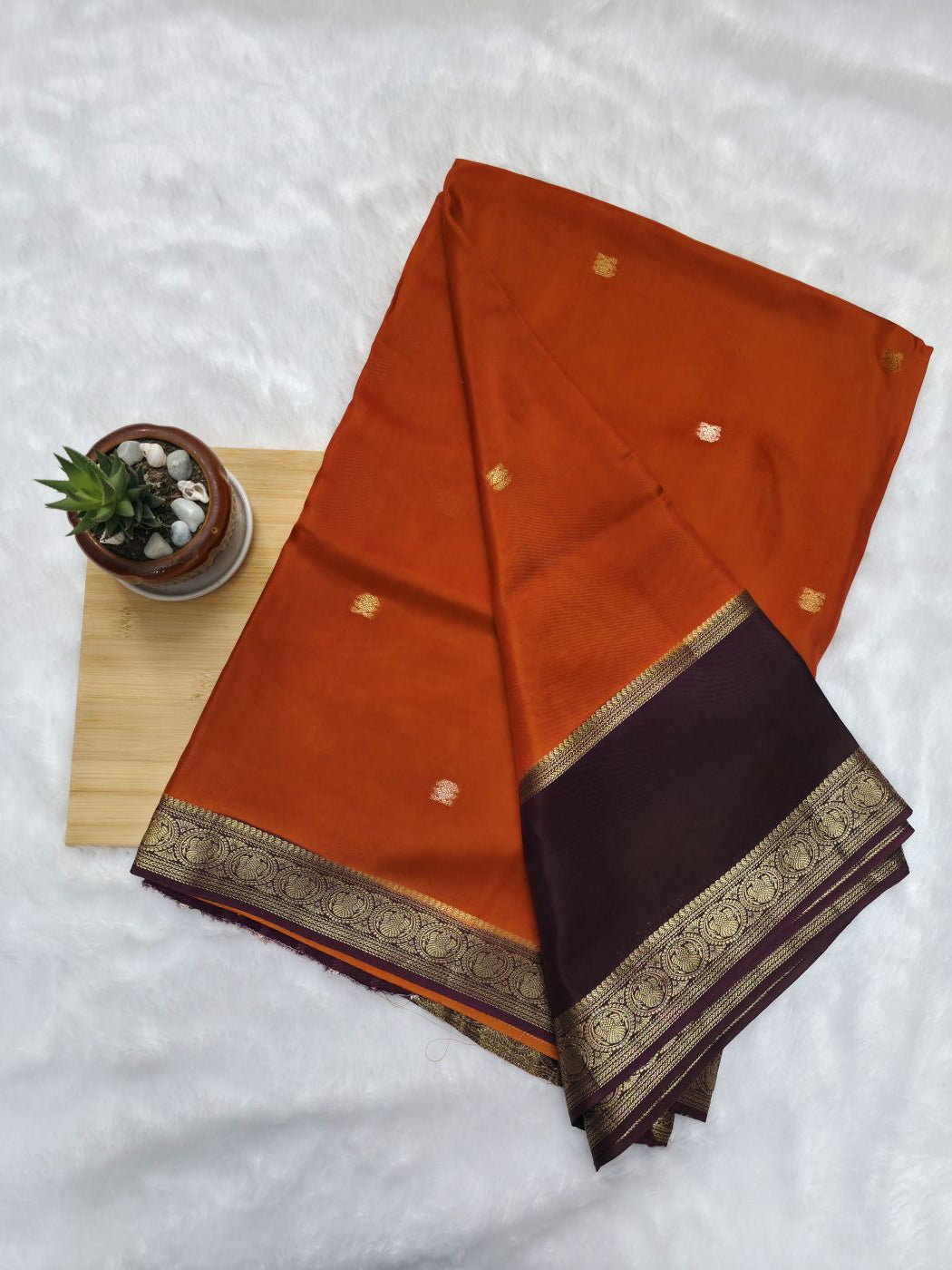 Orange Viscose Silk Saree with Gandaberunda Buttas & Brown Dual Zari Border