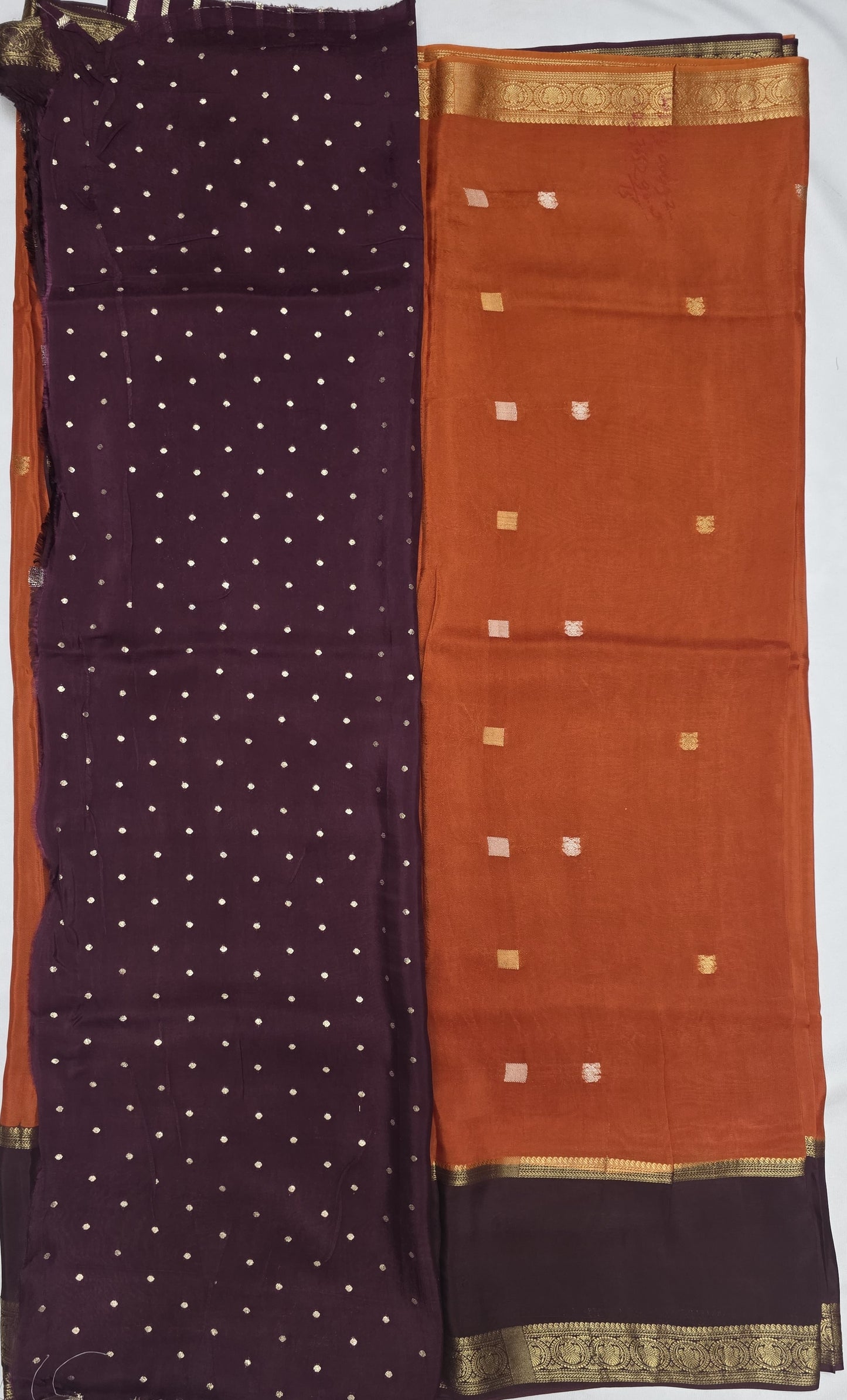 Orange Viscose Silk Saree with Gandaberunda Buttas & Brown Dual Zari Border